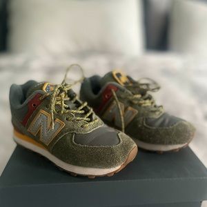 Boys New Balance 574 Camp lace up sneakers.